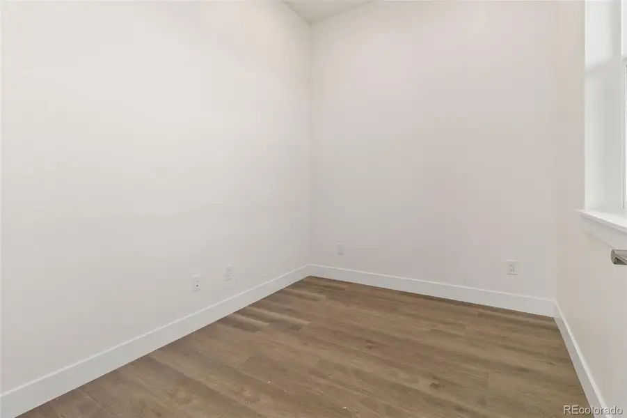 Spacious, unfurnished interior of a new home in Kitchel Lake at Serratoga Falls, Timnath (Image 9).