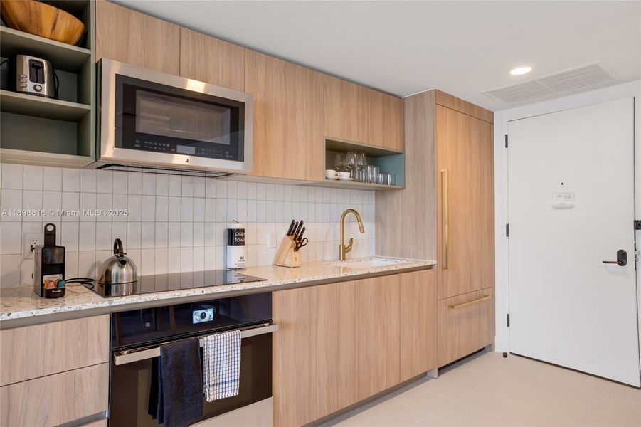 Furnished interior view inside a new home in , Miami (Image 8). Furnished interior view inside a new home in , Miami (Image 8).