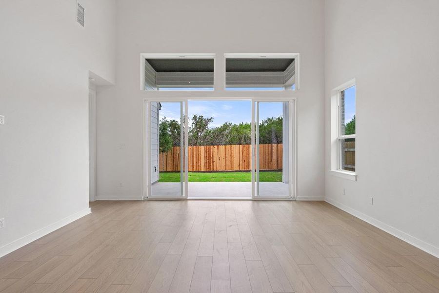 Spacious, unfurnished interior of a new home in Heritage, Dripping Springs (Image 17).