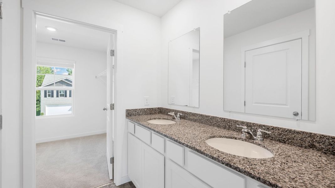 Representative furnished interior of a home built from the Edmon by D.R. Horton in Timber Creek, Rossville (Image 7).