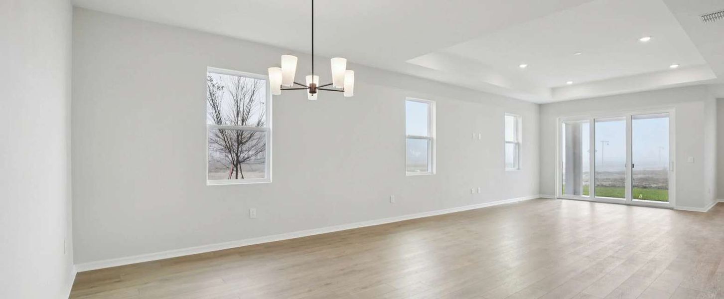 Dining space opens up into the family room space - Representative images and renderings are for illustrative purposes