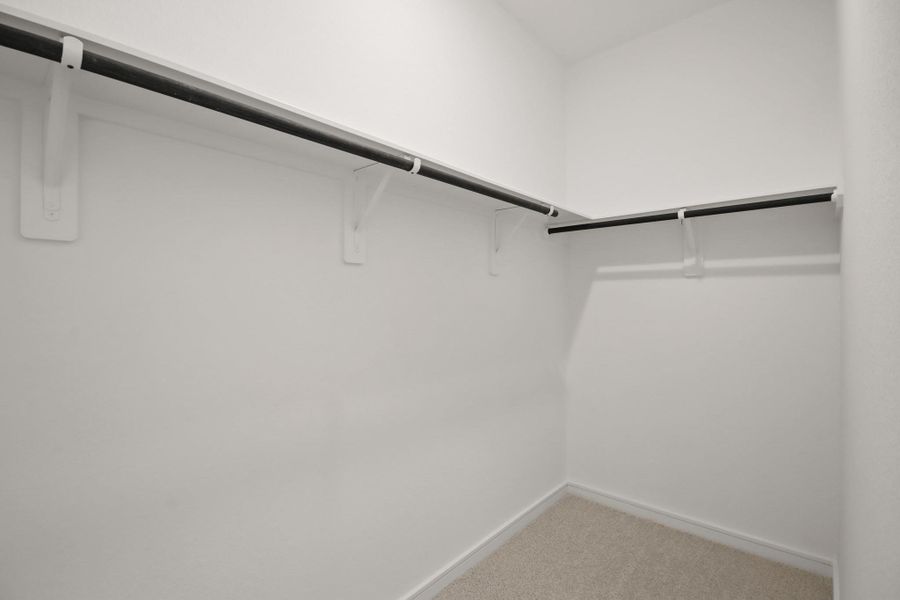 Walk-in closet in the primary suite