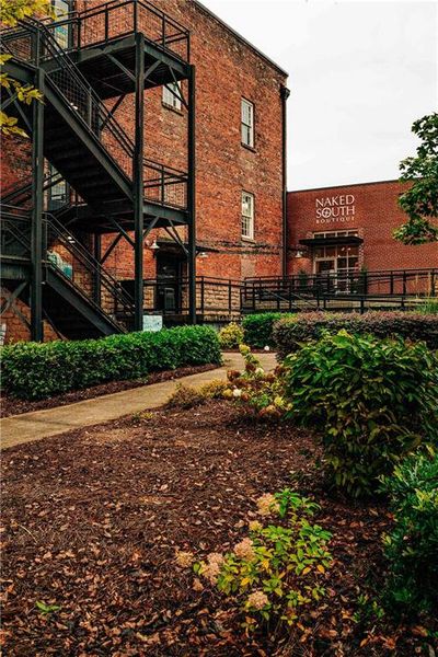 Front exterior of a new home in Rosewood Lake Estates, Hoschton, GA, highlighting curb appeal (Image 32).