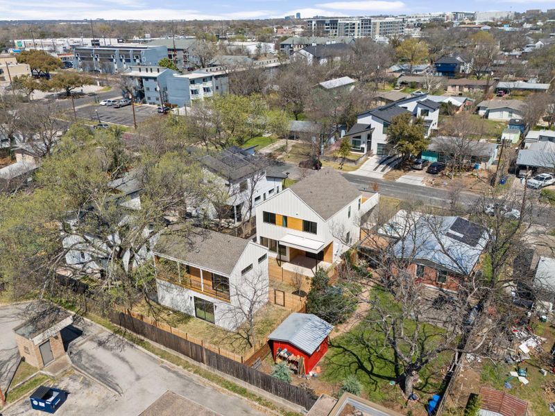 Birds eye view of property with a residential view