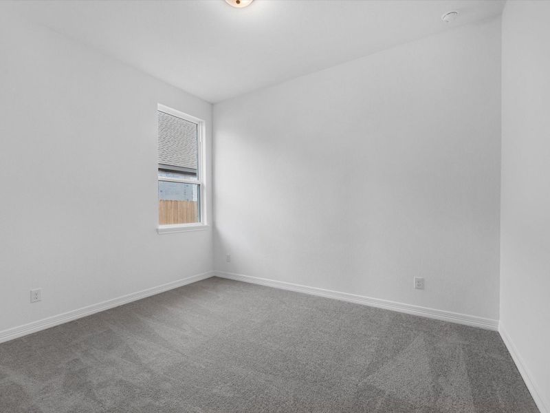 Spacious, unfurnished interior of a new home in Wildrye, Waller (Image 12).