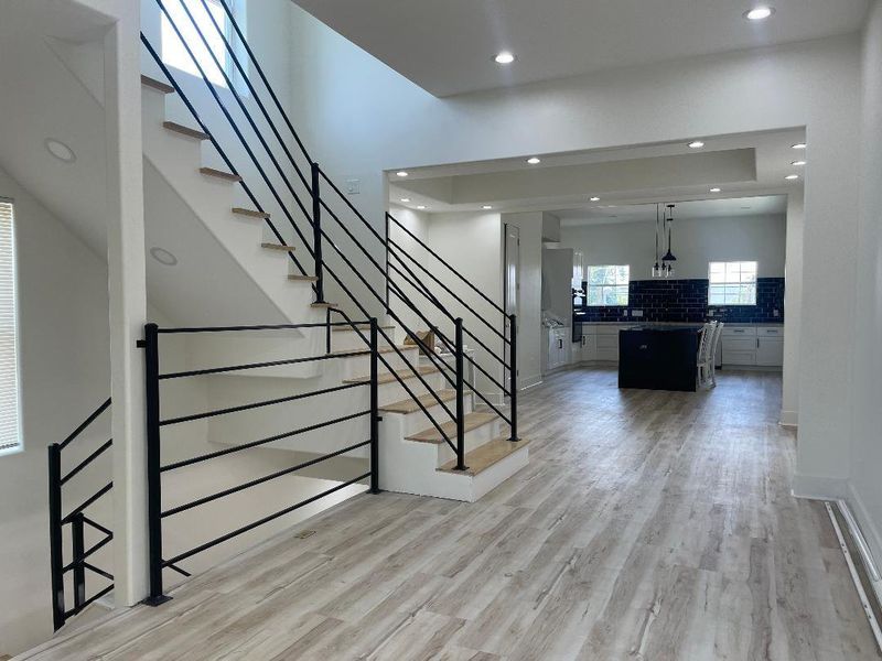 The dining room is adjacent to the kitchen and living room