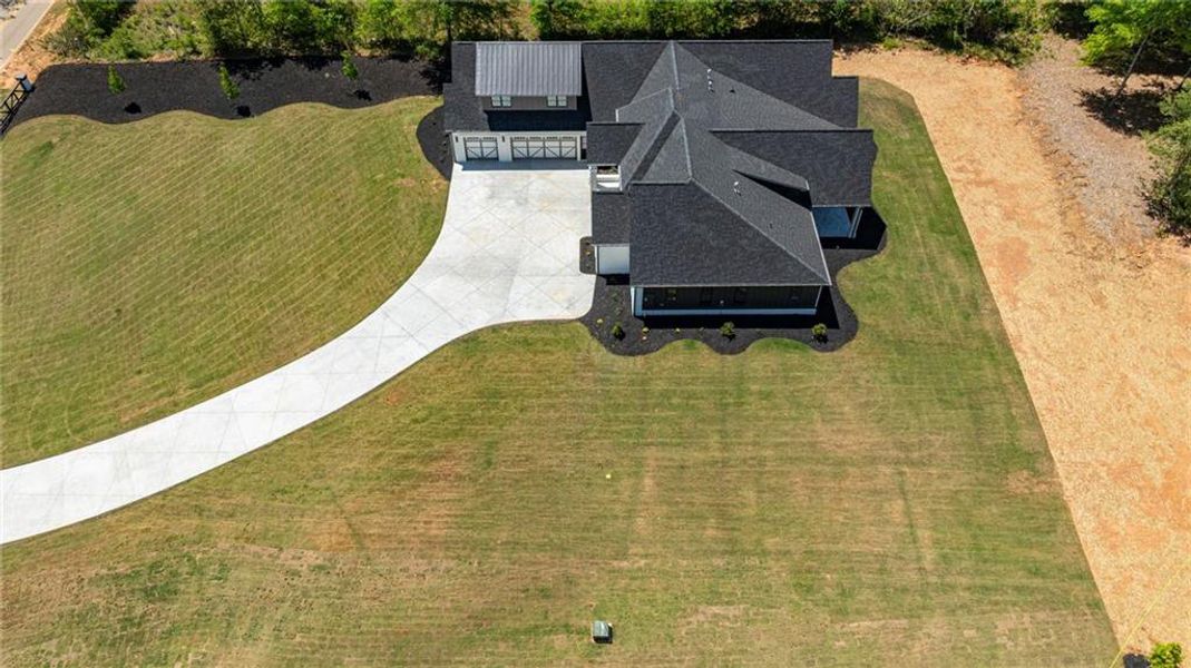 Front exterior of a new home in , Monroe, GA, highlighting curb appeal (Image 39).