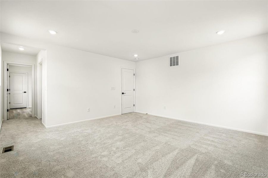 Spacious, unfurnished interior of a new home in Windsong, Thornton (Image 24).