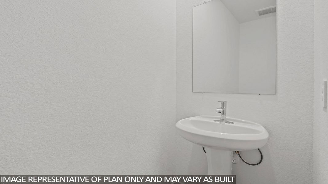 Close-up of interior finishes inside a home in Sunterra, Katy (Image 11).