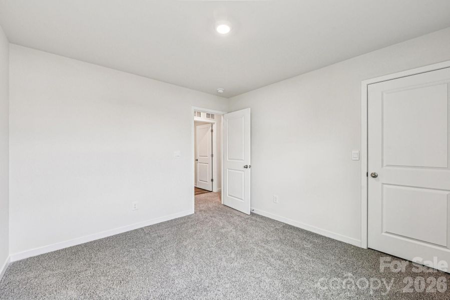 Spacious, unfurnished interior of a new home in Reedy Creek Preserve, Charlotte (Image 22).