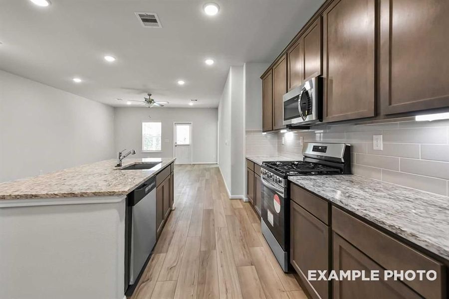Furnished interior view inside a new home in Lakes at Black Oak, Magnolia (Image 10).