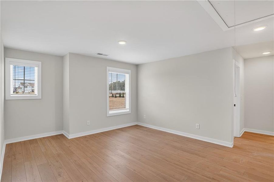 Spacious, unfurnished interior of a new home in The Fairways at Mirror Lake, Villa Rica (Image 17).