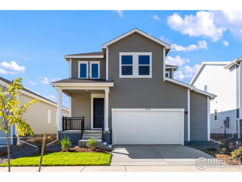 Front exterior of a new home in , Fort Collins, CO, highlighting curb appeal (Image 14). Front exterior of a new home in , Fort Collins, CO, highlighting curb appeal (Image 14).