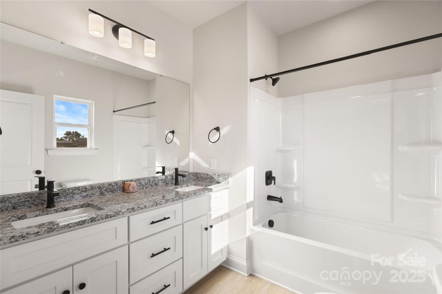 Furnished interior view inside a new home in , Olin (Image 11).