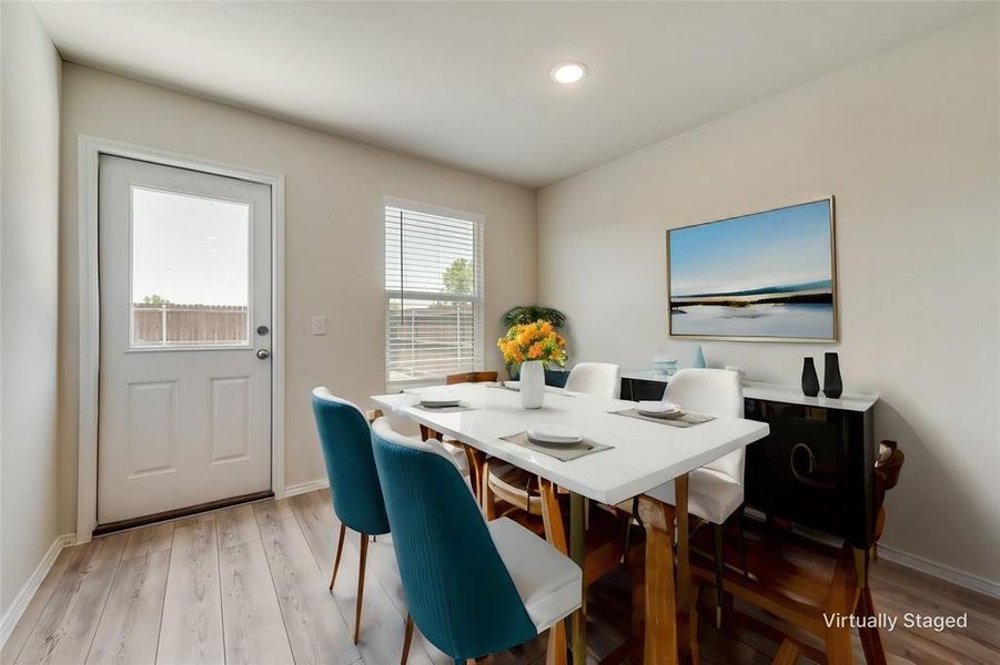 Dining space.  The door goes to the backyard.