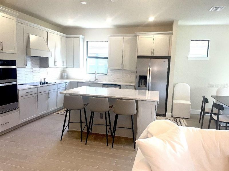 Furnished interior view inside a new home in Preserve at Waterway Village, Vero Beach (Image 4).