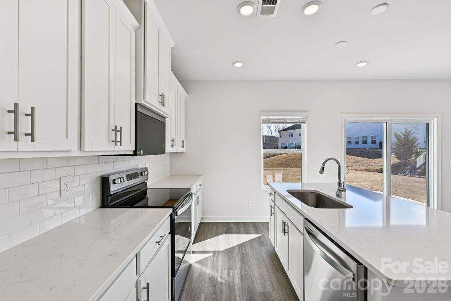 Photo is not of the actual home, but is an inspirational photo of builder’s model home and may depict options, furnishings, and/or decorator features that are not included