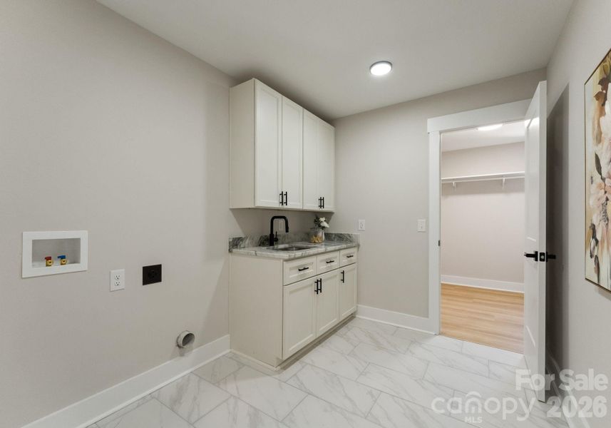 Laundry Room attached to Primary Closet