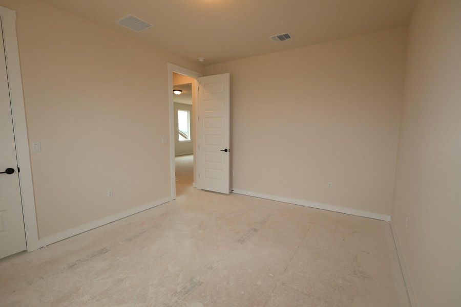 Spacious, unfurnished interior of a new home in Terrace Collection At Turner's Crossing, Buda (Image 7).