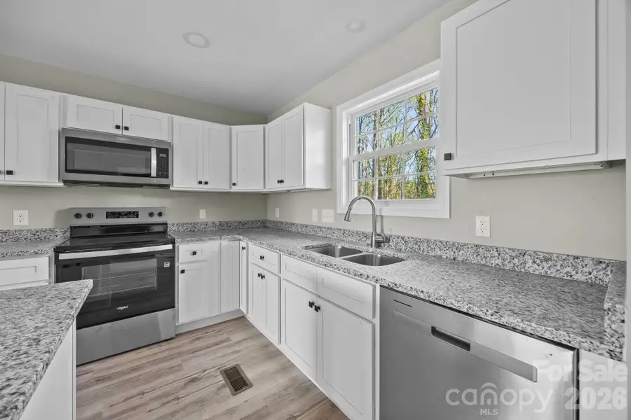 Lots of cabinet and counter top space