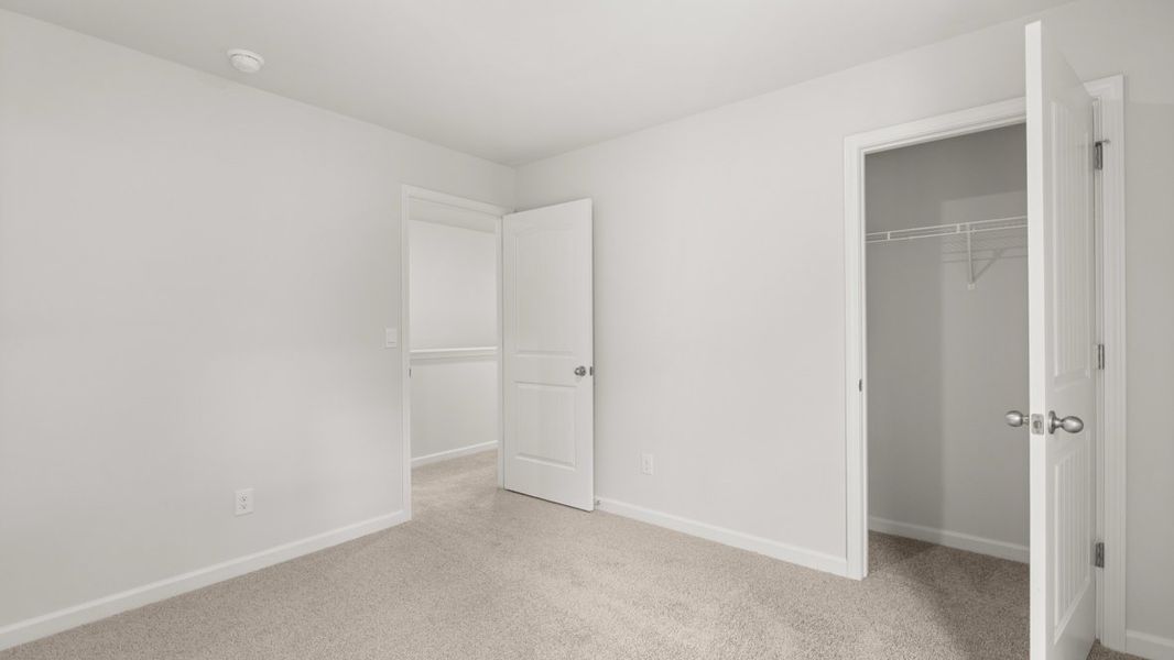 Representative unfurnished interior of a home built from the Hayden by D.R. Horton in Northwoods at Mirror Lake, Villa Rica (Image 33).