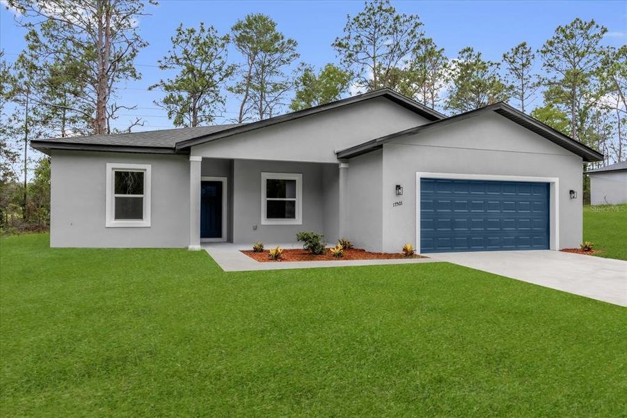 Front exterior of a new home in , Ocala, FL, highlighting curb appeal (Image 10).