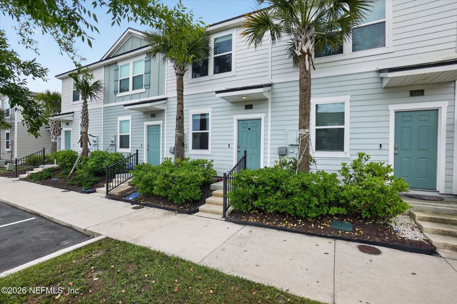 Exterior details and patio area of a home in Ravenswood Village, St. Augustine (Image 25).