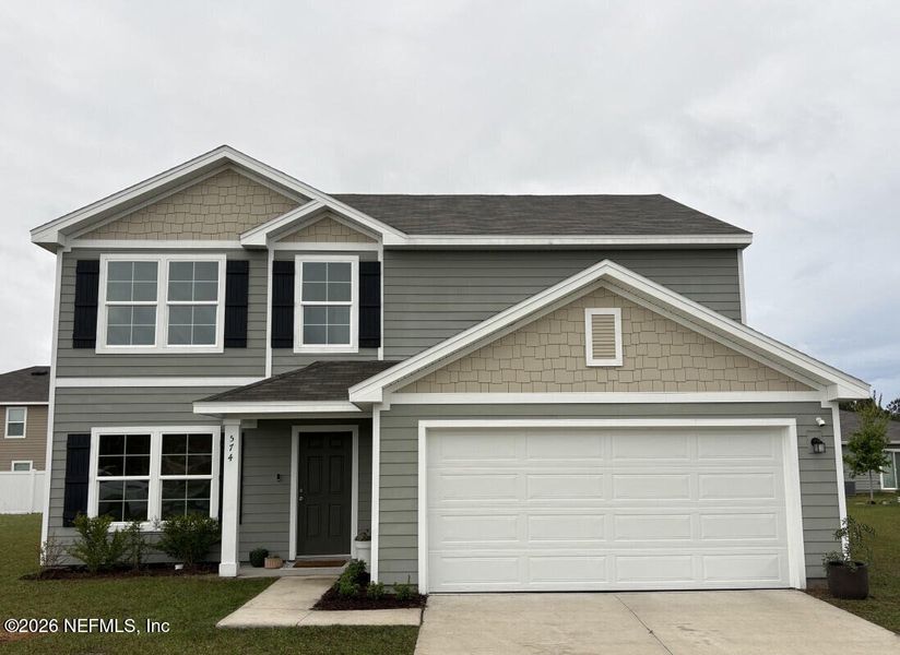 Front exterior of a new home in , Macclenny, FL, highlighting curb appeal (Image 1). Front exterior of a new home in , Macclenny, FL, highlighting curb appeal (Image 1).
