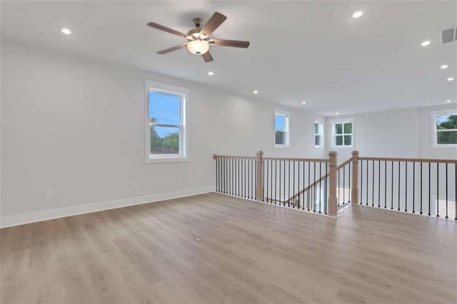 Spacious, unfurnished interior of a new home in The Paddocks at Doc Hughes, Buford (Image 29).