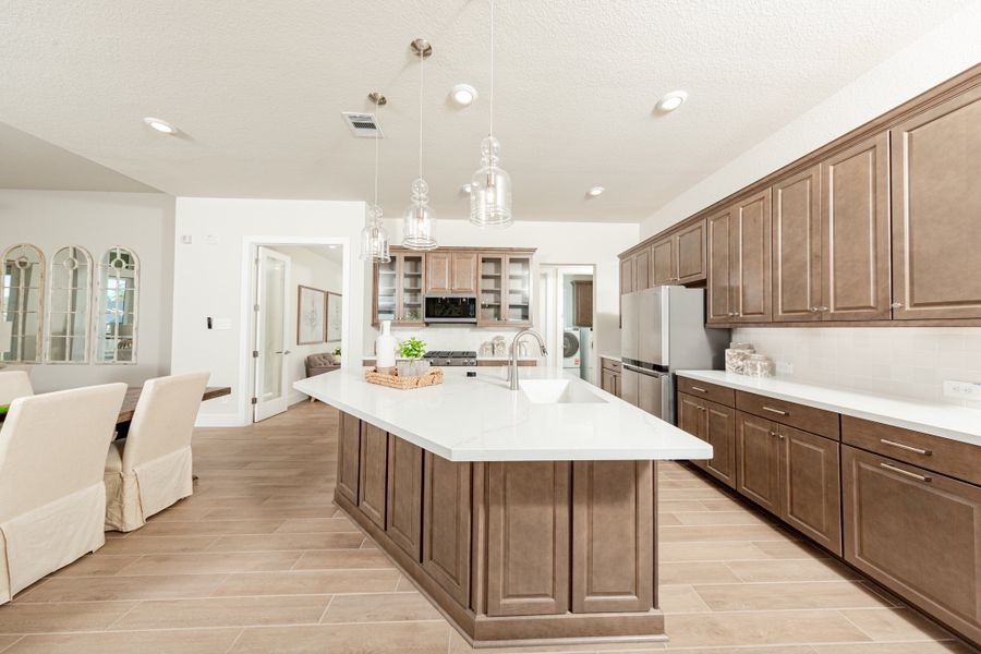 Representative furnished interior of a home built from the Sheffield by Beazer Homes in Meridiana, Iowa Colony (Image 4).