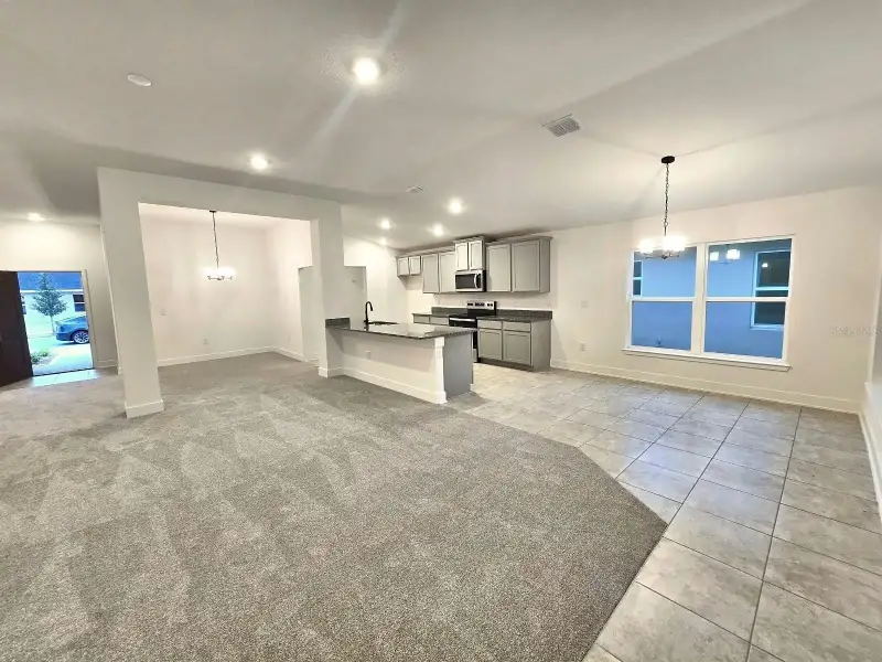 Spacious, unfurnished interior of a new home in Harmony Central, Harmony (Image 10).