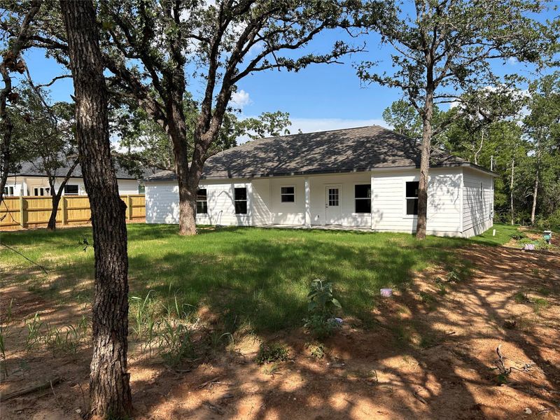 Front exterior of a new home in , Bastrop, TX, highlighting curb appeal (Image 23). Front exterior of a new home in , Bastrop, TX, highlighting curb appeal (Image 23).
