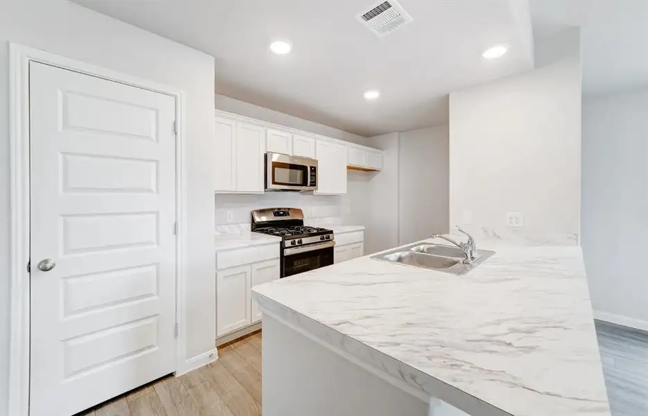 Furnished interior view inside a new home in Milford Farms, Milford (Image 3). Furnished interior view inside a new home in Milford Farms, Milford (Image 3).