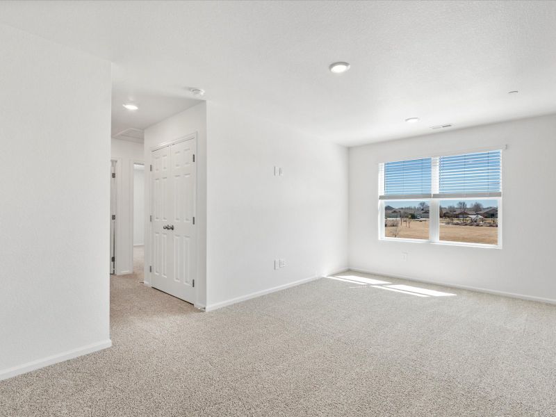 Spacious, unfurnished interior of a new home in Poudre Heights: The Meadow Collection, Windsor (Image 11).