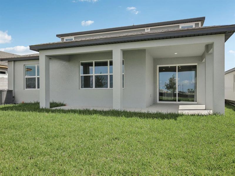 Exterior details and patio area of a home in Coasterra - Reserve Series, Palmetto (Image 2).
