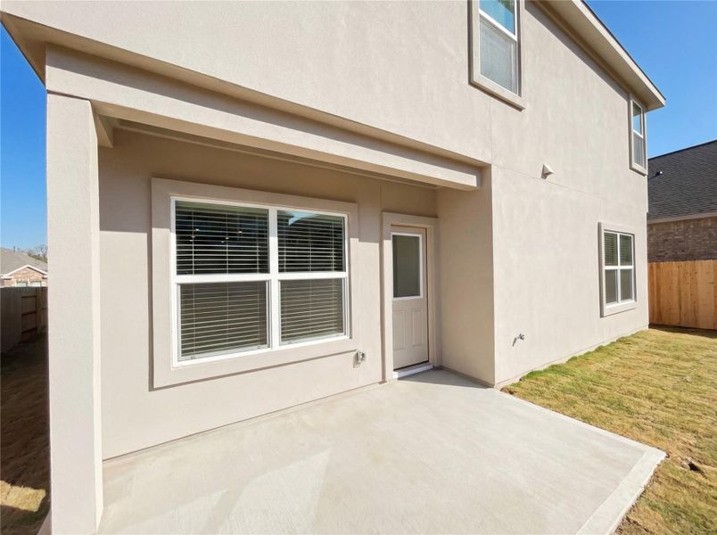 Exterior details and patio area of a home in The Colony, Bastrop (Image 3).