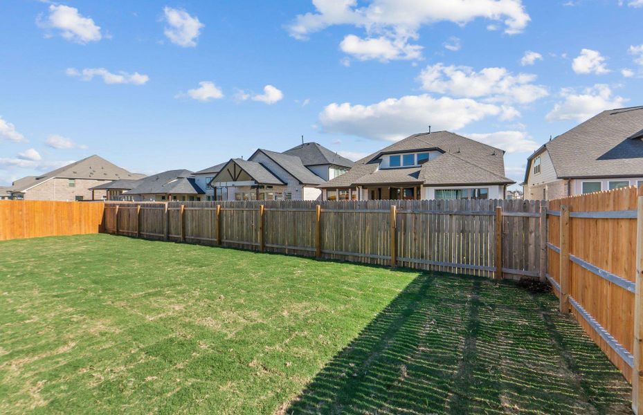 Exterior details and patio area of a home in Santa Rita Ranch, Liberty Hill (Image 3).