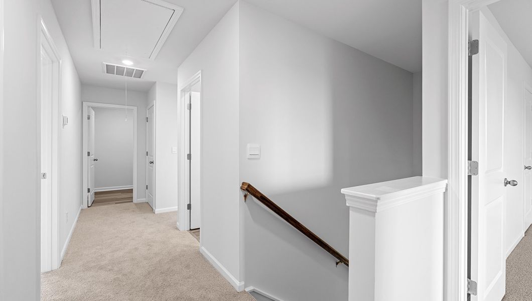 Spacious, unfurnished interior of a new home in Bentley Park, Greenwood (Image 24).