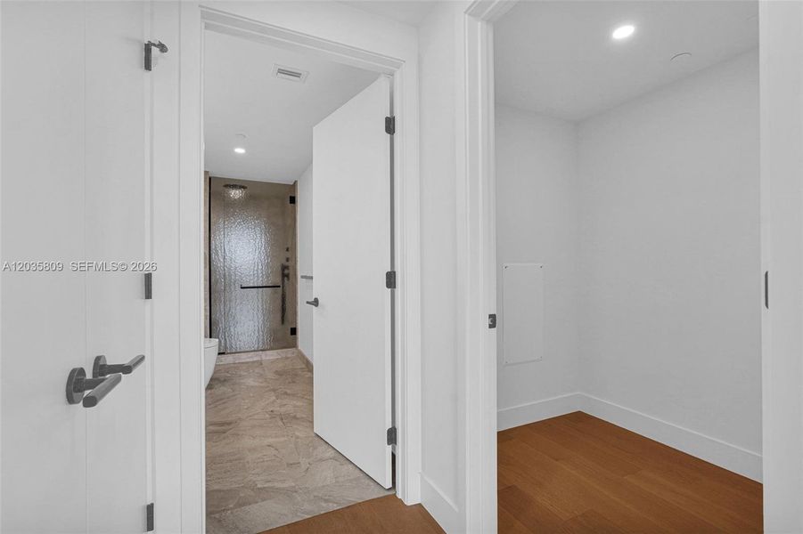 Spacious, unfurnished interior of a new home in , Bay Harbor Islands (Image 26). Spacious, unfurnished interior of a new home in , Bay Harbor Islands (Image 26).