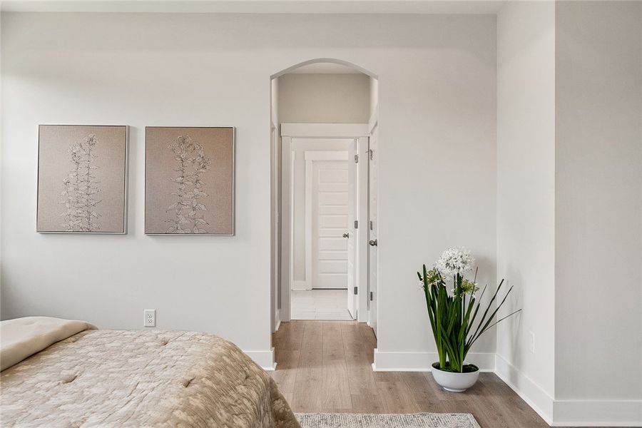 Hardwood-style flooring extends from the bedroom i Hardwood-style flooring extends from the bedroom i