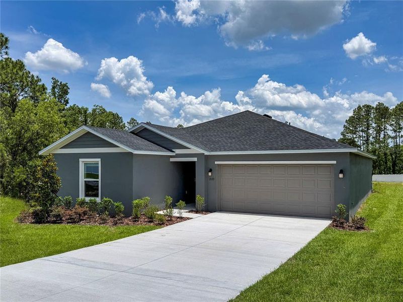 Front exterior of a new home in Marion Oaks, Ocala, FL, highlighting curb appeal (Image 19).