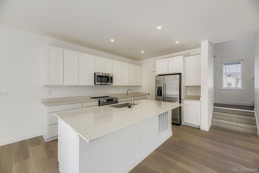 Furnished interior view inside a new home in Vermilion Creek: The Skyline Collection, Centennial (Image 7).