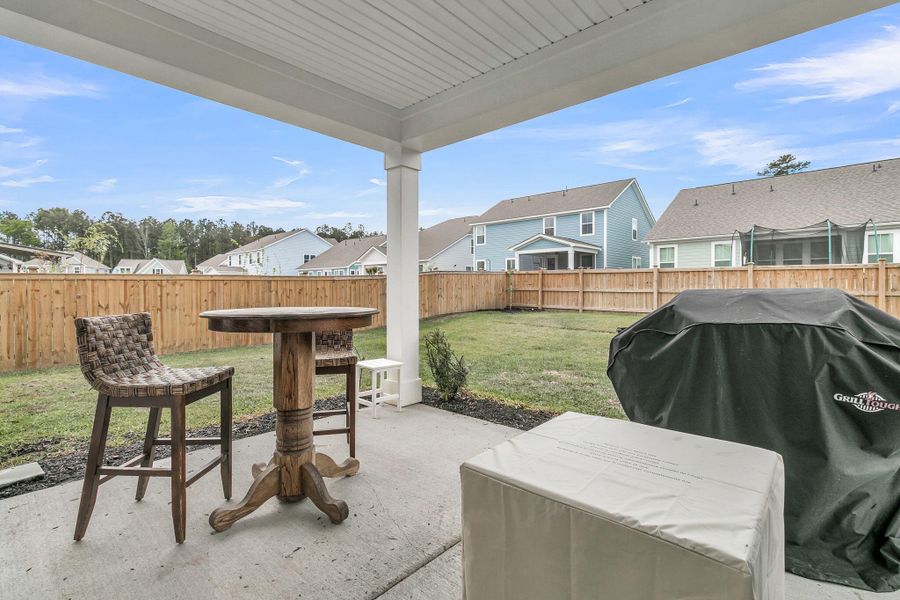 Exterior details and patio area of a home in High Point at Foxbank, Moncks Corner (Image 3).