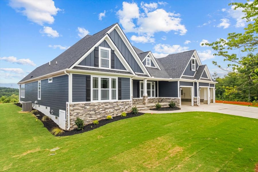 Representative exterior photo of a completed home built from the Converse Elite by Enchanted Homes in Pointe Summit, Slater-Marietta, SC (Image 28).