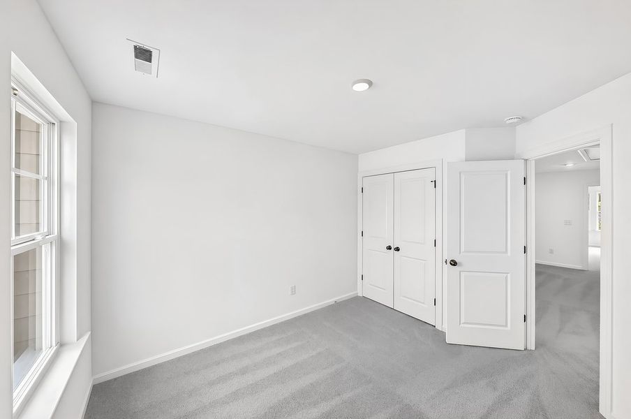Spacious, unfurnished interior of a new home in Magnolia Townes, Wendell (Image 15).