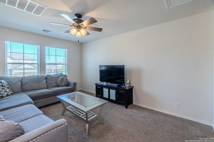 Furnished interior view inside a new home in The Links at River Bend, Floresville (Image 11).