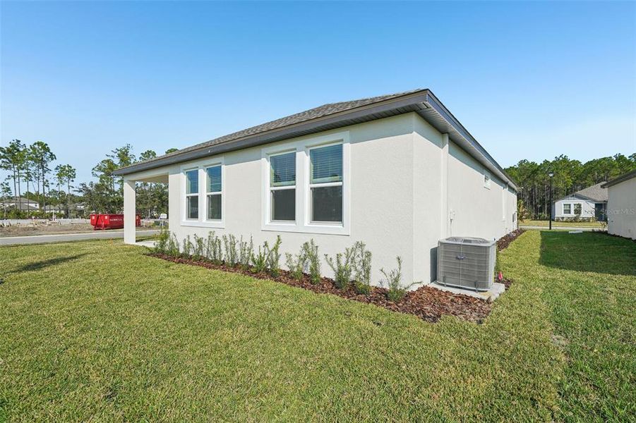 Exterior details and patio area of a home in Legends Preserve - Signature Series, Daytona Beach (Image 19). Exterior details and patio area of a home in Legends Preserve - Signature Series, Daytona Beach (Image 19).