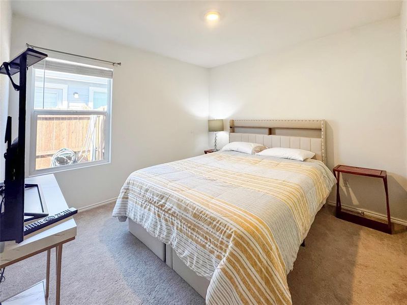 Bedroom featuring carpet flooring
