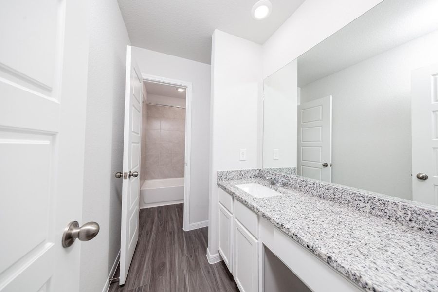 Furnished interior view inside a new home in Granger Pines, Conroe (Image 10).