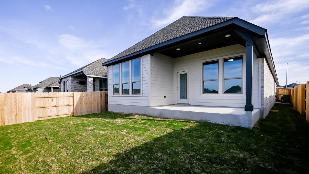 Exterior details and patio area of a home in Crosswinds 40', Kyle (Image 17).